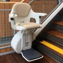 a straight stairlift for heavier users on straight wooden stairs
