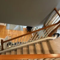 A Curved Stairlift Along The Inside Of The Stairs In Ontario, Canada